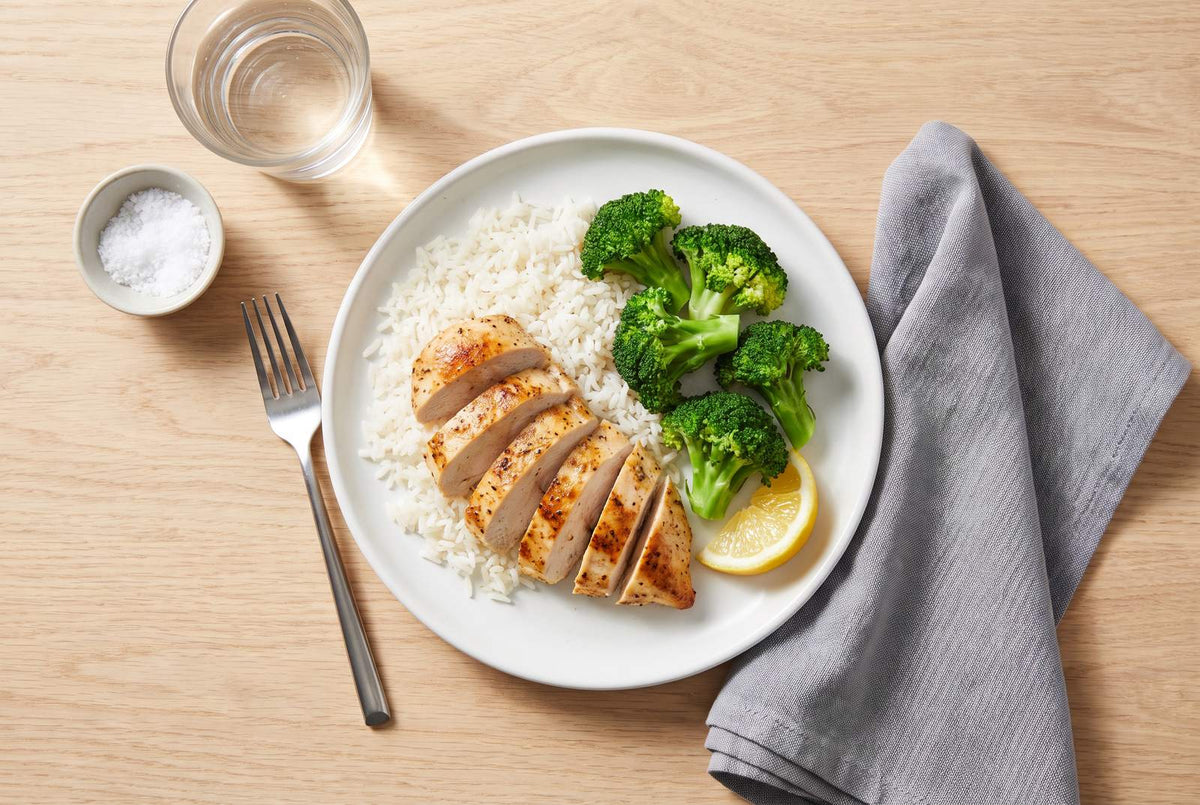 Post-workout plate from above: chicken breast, rice and broccoli provide protein and carbs after training