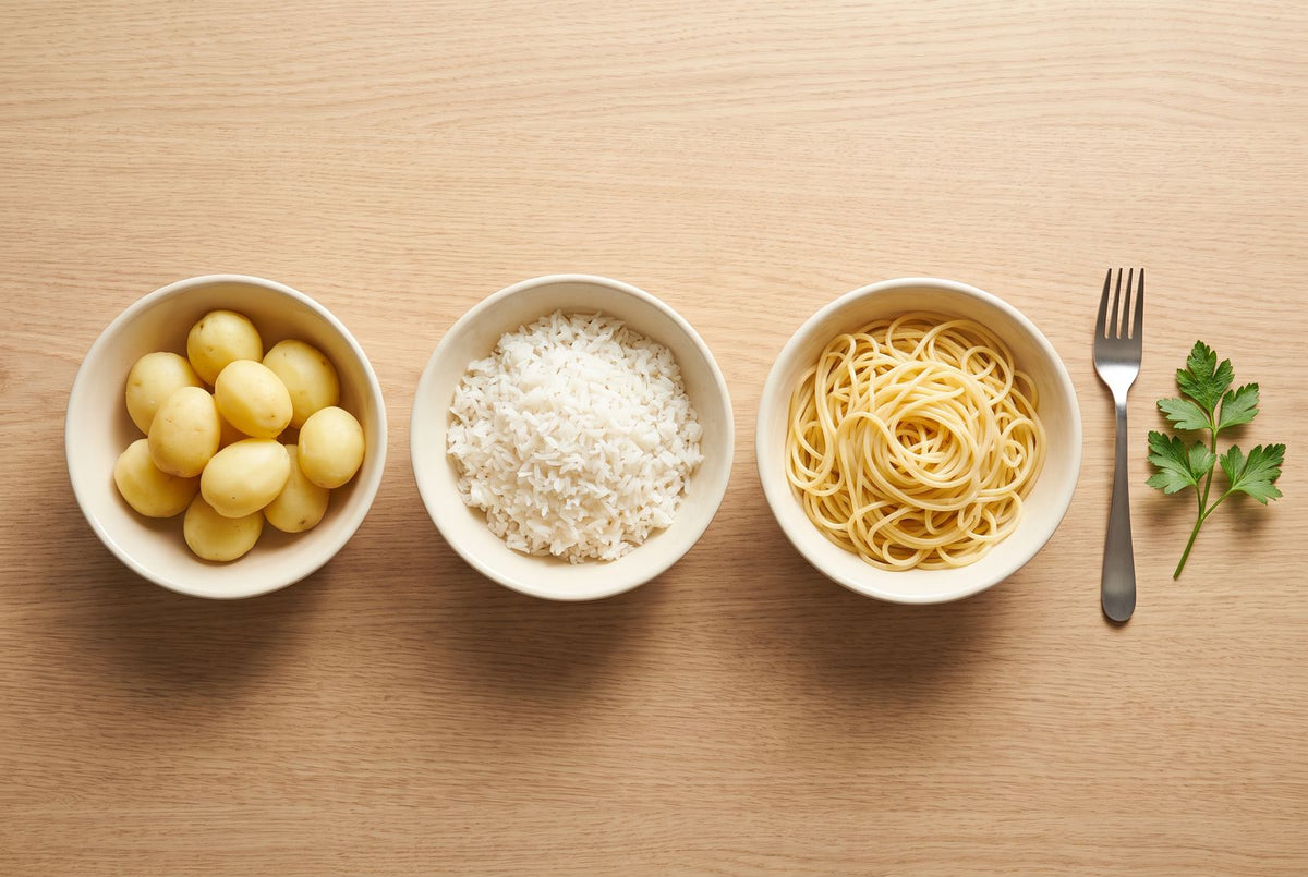 Three bowls of potatoes, rice and pasta compared: carbohydrates per portion